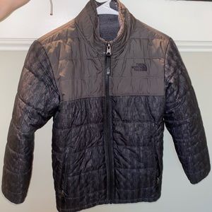 Dark grey and black north face jacket!
